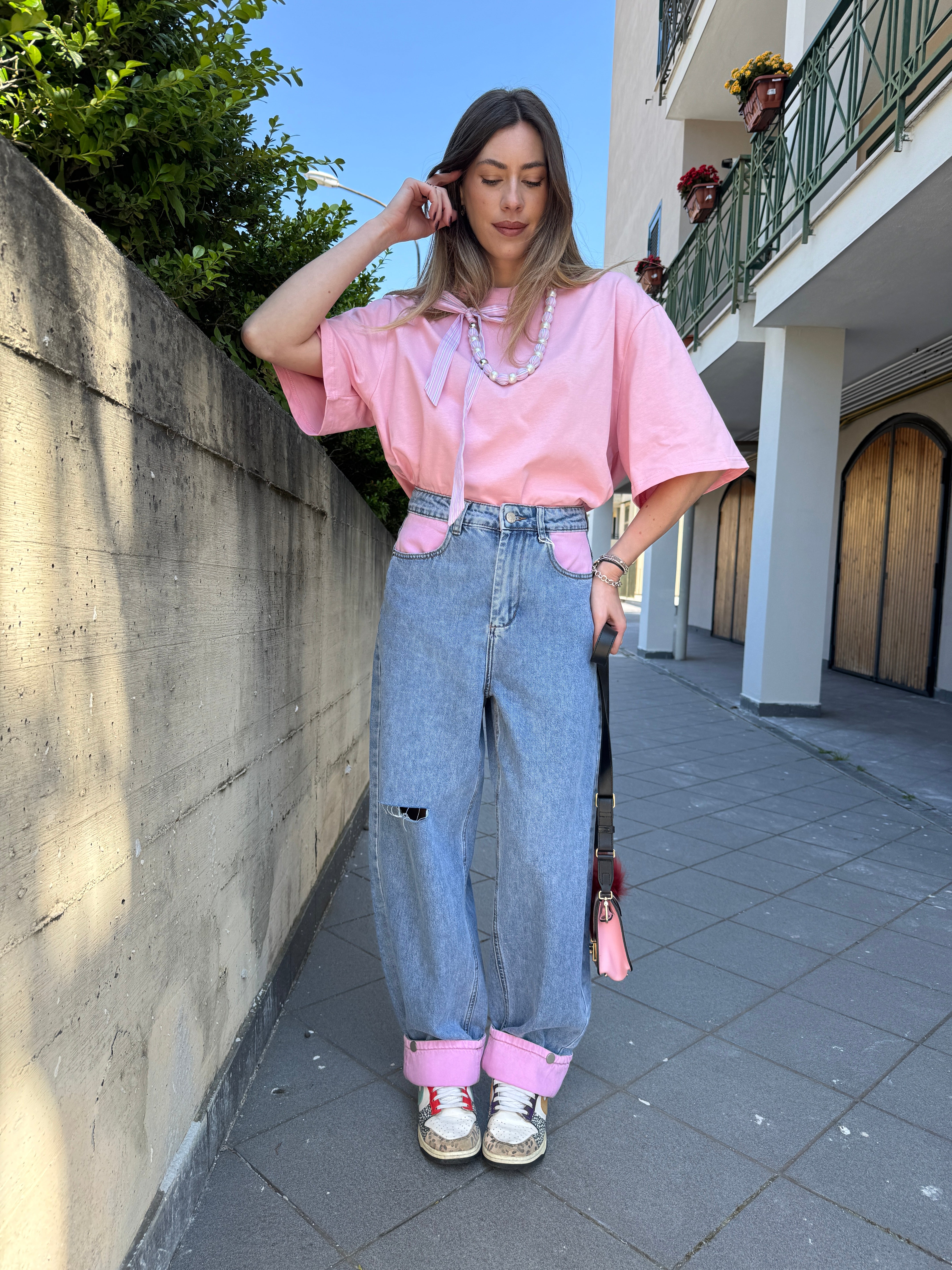 Jeans tasca rosa