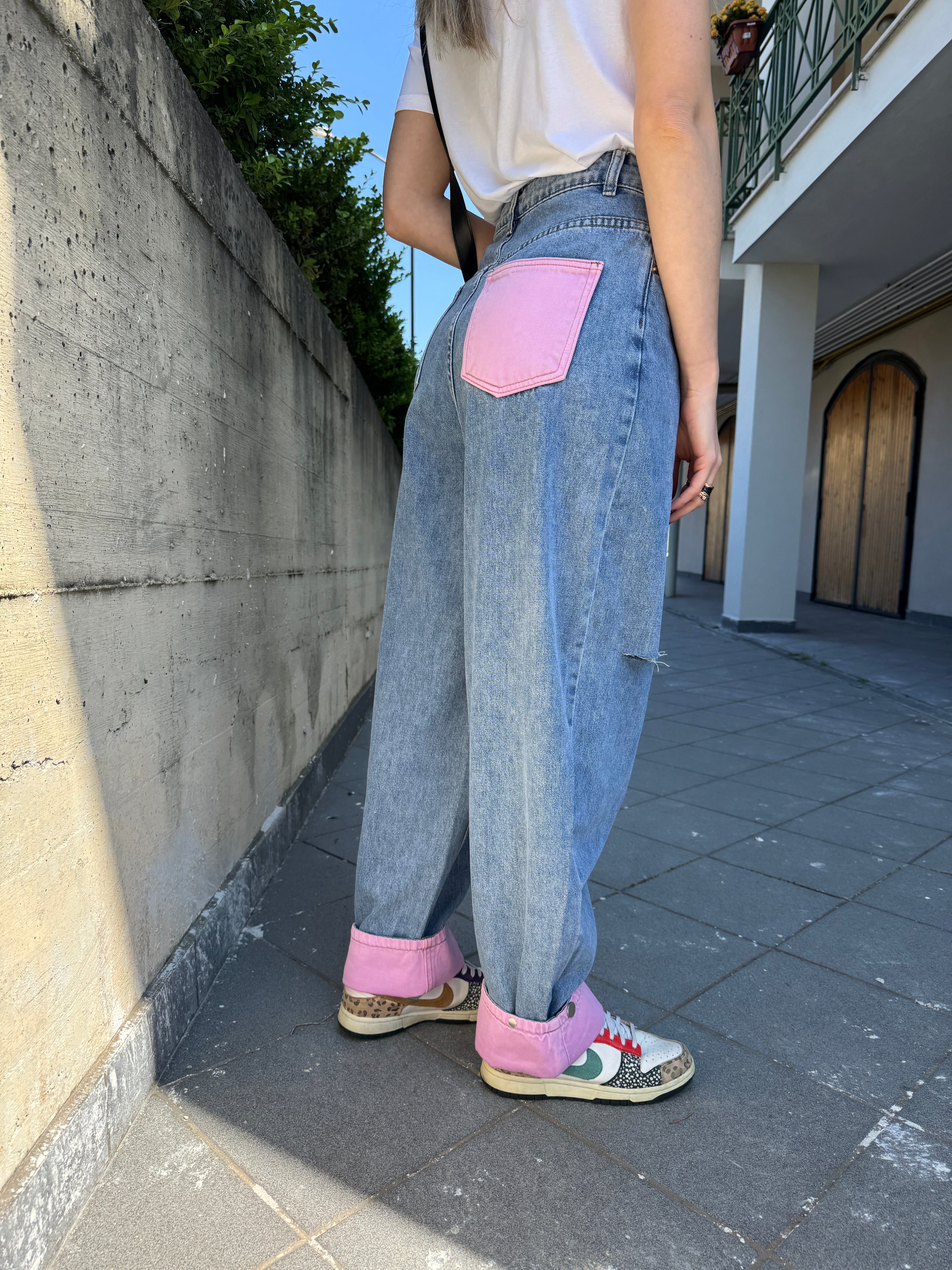 Jeans tasca rosa